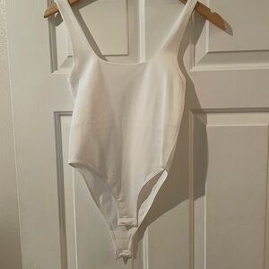 a new day White Scoop Neck women’s or junior’s One-Piece Bodysuit